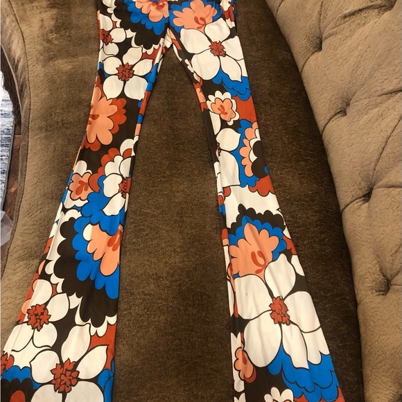 Ronny Kobo Jersey boho floral print flared hippie pants size small
Excellent! - Picture 4 of 4